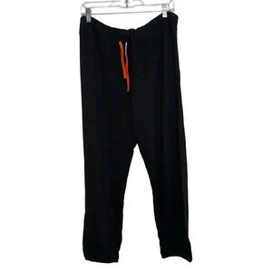 Sundry women’s NWT’s Joggers with rainbow drawstring in black. Size 4